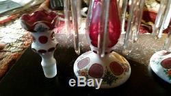An exqusit pair of hand painted cranberry glass 2 pc. Antique candle holders