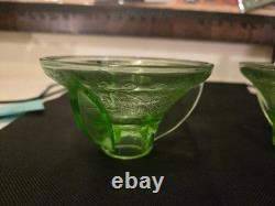 Cameo pattern green candle holders