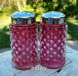 Fenton glass hobnail cranberry opalescent cruet, candle holders, shakers