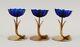 Gunnar Ander For Ystad Metall. Three Candlesticks In Brass And Blue Art Glass