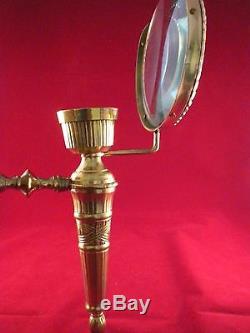 Pair of Brass Candle holders with magnifying glass