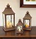 Set Of Three Brown Glass And Metal Lattice Floor Lantern Candle Holders