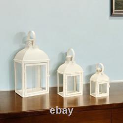 Set of Three Ivory Distressed Glass And Metal Floor Lantern Candle Holders