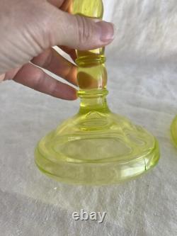 Vaseline yellow glass pillar candlestick holders