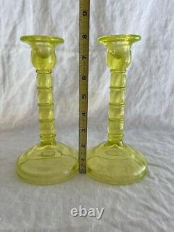 Vaseline yellow glass pillar candlestick holders